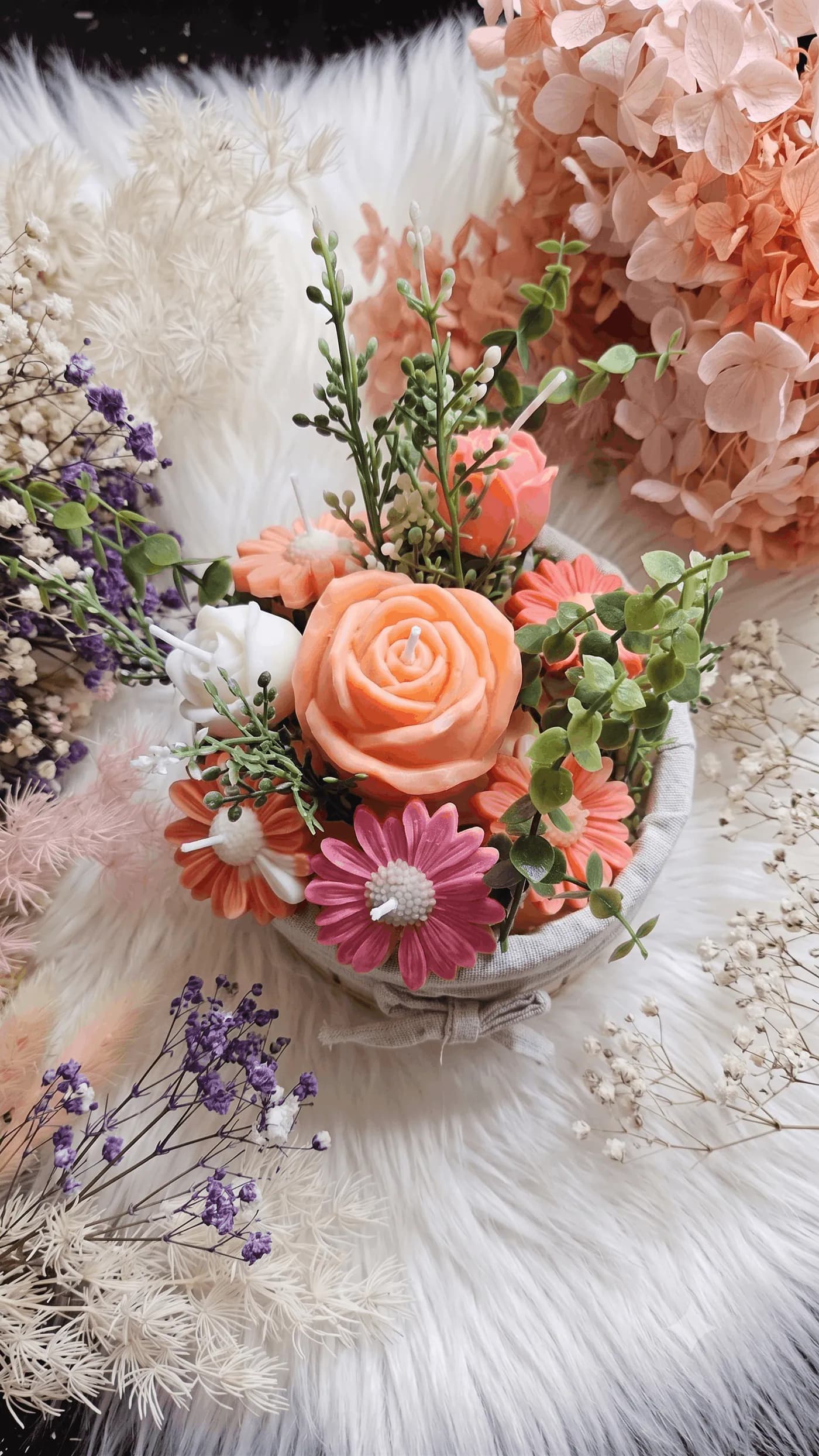 Floral candle bouquet with a peach rose and colourful daisies