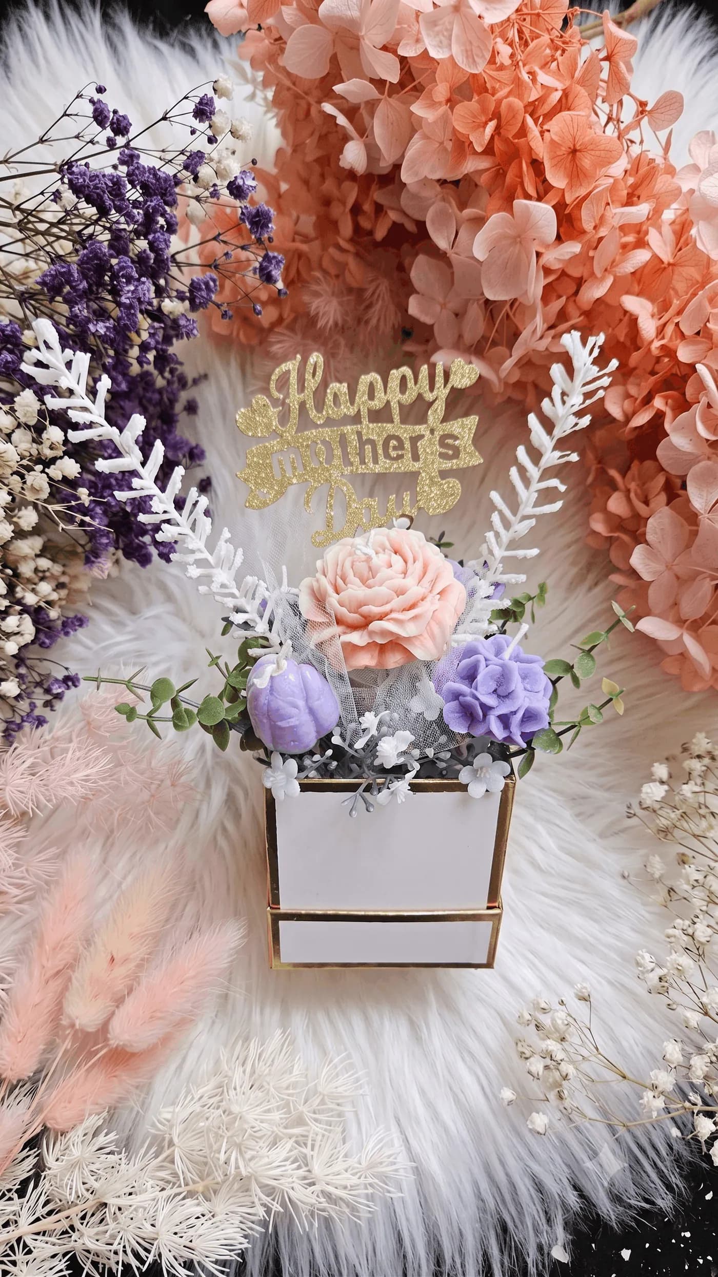 Mother's Day floral candle arrangement with a sculpted heart