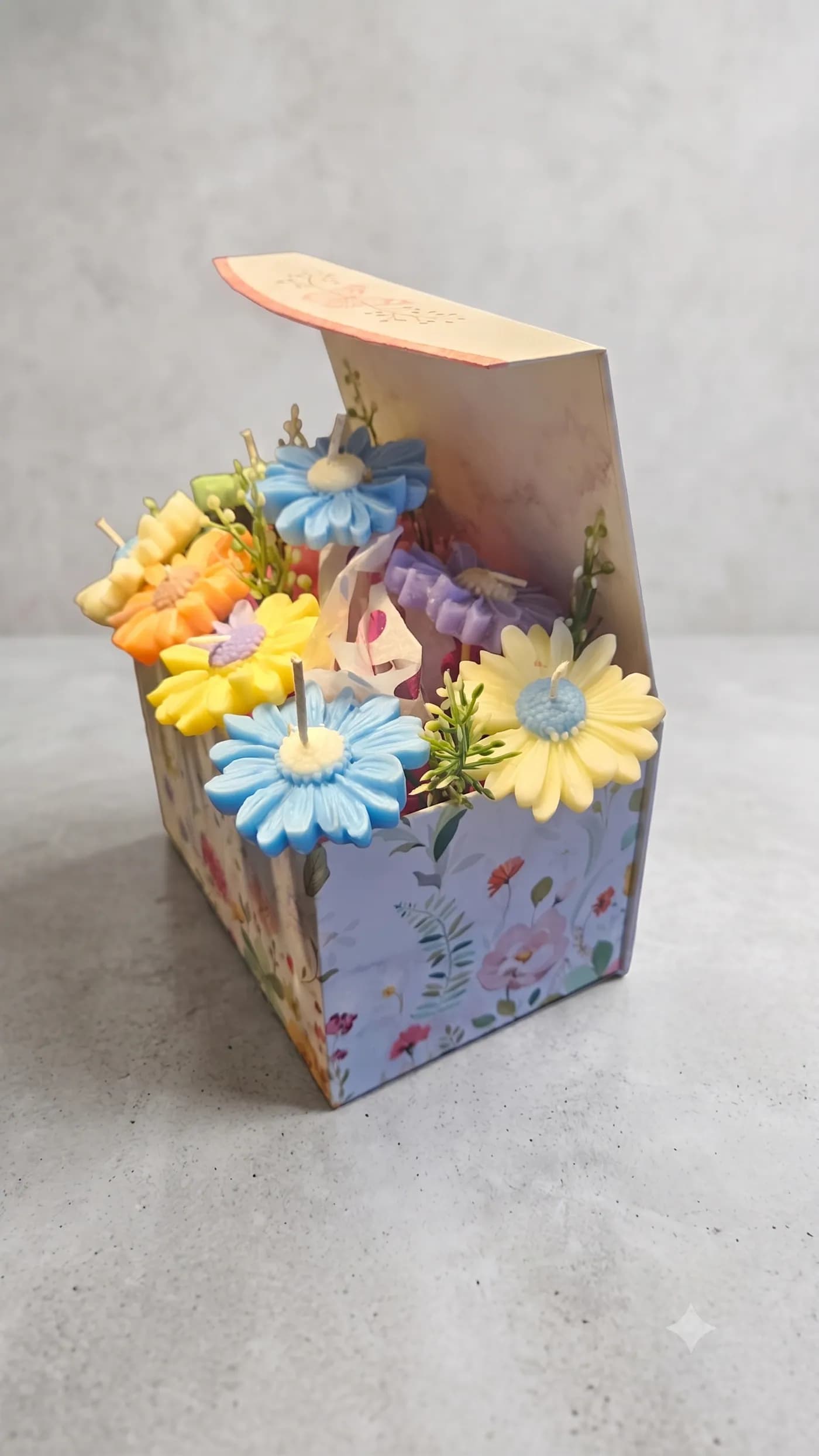 Colourful floral candle bouquet presented in a gift carton
